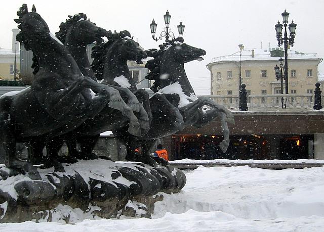 horces on snowed in fountain