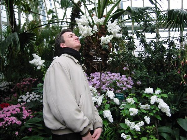konstantin smelling flowers