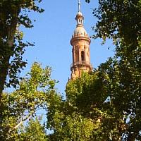 spanish pavillion behind trees