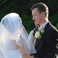you may now kiss the bride closeup