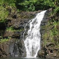 anastasia swimming in waterfall